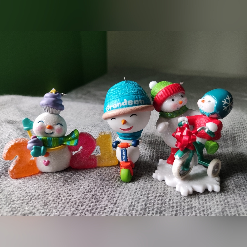 A set of snowman Hallmark Christmas Ornaments